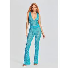 Retrofete Aqua Blue Nirvana Sequin Crochet Jumpsuit Women's Nwt Size M/L V Neck Size: M/L Condition: New With Tags Gender: Women's Material: 100% Viscose Knitted You've Never Seen Anything Like Our Nirvana Jumpsuit. This Crocheted, Sequined One-Piece Is Reminiscent Of The 70s, With Its Wide Leg Cut And Deep V-Neck. The Silhouette Is Finished With A Drawstring Waist For A Customizable Fit. Shown Here In Aqua Blue. Sequined V-neck Sets For Party, Fitted Blue Sets For Festivals, Fitted Jumpsuits And Rompers For Festive Summer, Fitted Jumpsuits And Rompers For Summer Festivals, Glamorous Blue Sleeveless Jumpsuits And Rompers, Glamorous Blue Jumpsuits And Rompers For Summer, Glamorous Blue Sequined Pants, Glamorous Blue Pants For Party, Glamorous Blue Party Pants