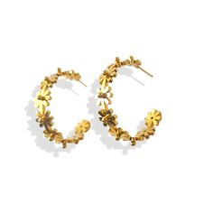 These 18K gold-plated Flower Power Hoops are the perfect spring accessory. Lightweight and comfortable to wear, these hoops will surely be your go-to accessory for the season. A bestseller, you won’t regret adding these earrings to your jewelry collection. Spring Hoop Earrings With Flower Charm As Gift, Gold Flower Earrings For Spring, Spring Flower Charm Hoop Earrings As Gift, Spring Gift Hoop Earrings With Flower Charm, Trendy Hoop Earrings With Flower Charm For Spring, Spring Hoop Earrings With Flower Charm, Trendy Gold Hoop Earrings For Spring, Spring Flower Hoop Earrings, Elegant Spring Hoop Earrings With Flower Charm