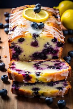 a loaf of lemon blueberry bread sitting on top of a wooden cutting board