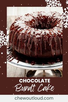 a chocolate bundt cake on a plate with snowflakes around it and the words, chocolate bundt cake