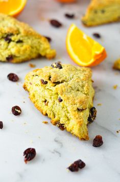 oranges and cranberry scones on a table