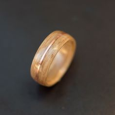 a wooden ring sitting on top of a table