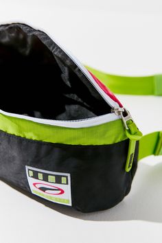 Perfect for giving your off-the-clock looks an instant does of street style, this PUMA fanny pack stands out from the crowded field of belt bags with sporty and vibrant colorblocking. DETAILS Fabric: Technical weave Rubber zip tassels Logo patch Zip at top Lined Weight: 5oz / 0.14kg Imported Measurements Height: 4.25in / 11cm Length: 13.5in / 34cm Depth: 3.5in / 9cm Belt length: 26.75-42.25in / 68-107cm City Block, Belt Length, Belt Bags, Adjustable Belt, Fanny Pack, Belt Bag, Patch Logo, Color Blocking, Urban Outfitters