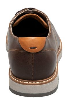 A plain toe and streamlined silhouette lend timeless sophistication to a rich leather derby grounded by a cushioned footbed and flexible rubber sole. Lace-up style Cushioned footbed Leather upper/textile lining/rubber sole Imported Brown Moc Toe Oxfords With Textured Sole, Brown Dress Shoes With Plain Toe And Removable Insole, Brown Oxfords With Branded Insole And Plain Toe, Cushioned Leather Shoes For Business Casual, Brown Plain Toe Oxfords, Brown Leather Shoes With Removable Insole For Derby, Business Derby Shoes With Textured Sole, Derby Slip-on Oxfords With Textured Sole, Derby-style Slip-on Oxfords With Textured Sole