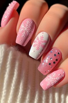 21 Pink Christmas Nail Trends to Try in 2024 Pink Christmas Nail, Christmas Gel, Cute Christmas Nails, Snowflake Nails, Blue Nail, Winter Nail Art, Winter Nail Designs