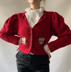 "Cute vintage cardigan.  Condition: Great vintage condition.  Material: pure new wool Model is a size M, 167cm/65.7\" Contact me if you need any additional information." Vintage Floral Embroidered Long Sleeve Cardigan, Red Vintage Outerwear With Floral Embroidery, Vintage Red Outerwear With Floral Embroidery, Vintage Red Embroidered Outerwear, Red Folk Style Spring Outerwear, Vintage Wool Cardigan With Long Sleeves, Vintage Wool Long Sleeve Cardigan, Vintage Long Sleeve Wool Cardigan, Vintage Red Cardigan For Spring