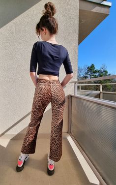 Very good vintage quality Dolce & Gabbana animal print pants. Very unique.  For your reference, model wears size XS-S, is 177 cm tall and 53 kg weight. For her pants fits perfectly. Stretch Wide Leg Leopard Print Pants, Fall Straight Leg Leopard Print Pants, Chic Leopard Print Trousers, Chic Leopard Print Straight Leg Bottoms, Chic Straight Leg Leopard Print Pants, Stretch Leopard Print Wide Leg Bottoms, Stretch Wide Leg Leopard Print Bottoms, High Waist Leopard Print Bottoms For Fall, High Waisted Leopard Print Bottoms For Fall