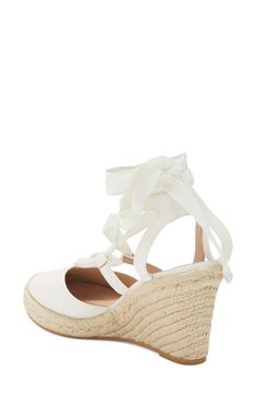 Make a striking statement in this ankle wrap-up sandal that's crafted from pure cotton and lifted by an espadrille wedge heel. 3" heel Lace-up closure Fabric upper, PU and leather lining, TPU sole 
 Imported Ankle Wrap Sandals, Wrap Sandals, Ankle Wrap, Espadrille Wedge, Sandal Women, Espadrilles Wedges, Stuart Weitzman, Wedge Heels, Nordstrom Rack