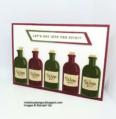 a card with three bottles of wine on the front, and one bottle in the back