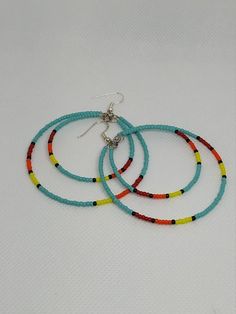 Check out this item in my Etsy shop https://www.etsy.com/listing/707842364/large-beaded-hoop-earrings-orange-double Southwestern Style Beaded Dangle Hoop Earrings, Turquoise Beaded Dangle Hoop Earrings, Nickel-free Southwestern Hoop Earrings, Turquoise Dangle Hoop Earrings With Colorful Beads, Turquoise Hoop Earrings With Dangling Beads, Southwestern Dangle Hoop Earrings With Ear Wire, Southwestern Beaded Hoop Earrings, Southwestern Adjustable Hoop Jewelry, Southwestern Style Adjustable Hoop Jewelry