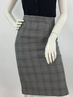 "1980s tartan plaid skirt, pencil skirt, lined fitted pencil skirt, size small  mannequin measures 5ft 8\", bust 34\", waist  Measurements:  waist 12\"/hip 17\"/length 25\" Please note that vintage clothing sizes can vary greatly.  The Measurements provided  are approximate and are taken lying flat.  I suggest taking a similar garment from your wardrobe and measure it while lying flat.  This way you can compare measurements.  All of our pieces are genuine vintage. Don't forget to enlarge the pho Elegant Fitted Plaid Skirt, Plaid Pleated Skirt For Work, Fitted Plaid Skirt For Office, Fitted Plaid Pencil Skirt, Elegant Plaid Mini Skirt For Work, Plaid Lined Mini Skirt For Work, Plaid Mini Skirt With Lining For Work, Plaid Pencil Skirt For Work, Fitted Houndstooth Pencil Skirt