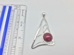 Hi everyone, just wanted to let you know we are open and shipping daily. Red Coral Pendant // Silver Coral Pendant //Geometric Sterling Silver Setting Length: 2.25 inches Weight: 7.5 grams Stone: 14mm Hallmark 925 Bail: 6mm I chose the coral used in this line of jewelry because it is sustainably sourced bamboo coral. The coral itself is taken from specimens which are no longer alive therefore not interfering with ecosystem which thrives on live coral. The color is then enhanced using lasers and Bamboo Coral, Live Coral, White Pearl Earring, Coral Pendant, Turquoise Ring Silver, On Live, Ring Photos, Pendant Silver, Ecosystem