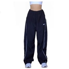 Navy blue Nike 90’s tracksuits Nike Blue Parachute Pants, Blue Nike Pants Outfit, Nike Oversized Pants, Nike 90s Vintage Outfit, Nike Joggers Aesthetic, Retro Nike Pants, Nike Joggers Vintage, Nike Blue Pants, Navy Blue Nike Track Pants