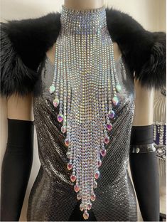 Make a bold statement with this ornate choker featuring long rhinestone strands and large teardrop jewels at the bottom. This 18-inch beauty adds a touch of glamour to any outfit.Ornate, choker with long rhinestone strands with large teardrop jewels at the bottom. 18 inches long. window.adminAccountId=2676506363; Random Clothes, Diy Necklace, Online Boutique, Choker, Boutique, Beauty, Quick Saves, Clothes