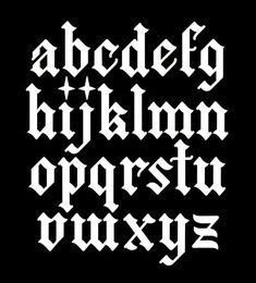 the upper and lower case of an old english typeface, in white on black