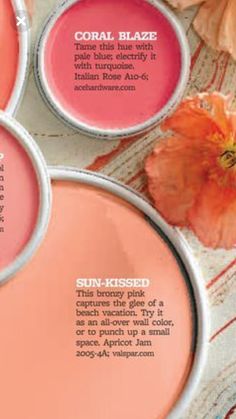 three different shades of pink and orange on a table next to an orange flower with the words coral blaze written below it