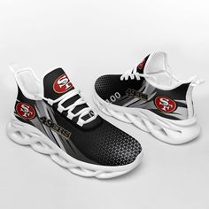 a pair of black and white sneakers with san francisco logo