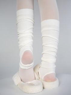 Inspired by classic ballet aesthetics, these leg warmers add a touch of grace and sophistication to any outfit, whether you're in the studio or on the streets. Choose from four beautiful colors to match your personal style and mood. Featuring a stirrup design, these leg warmers stay securely in place. Casual Footless Legwear For Spring, Casual Footless Spring Legwear, Casual Spring Footless Legwear, Soft Fitted Leg Warmers For Fall, Spring Balletcore Stretch Bottoms, Stretch Cream Socks For Winter, Soft Stretch Winter Leg Warmers, Trendy Elastic Footless Leg Warmers, Soft Footless Leg Warmers