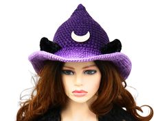 This ombre casual witch hat with velvet cat ears is so fun to wear! Ready to ship and will add the perfect touch for an event, a costume, a renfaire festival, or just for witchy fun. I made this in a gradient purple that ombres from dark at the tip to lilac at the brim edge. The velvet cat ears can be pinched to be more pointy or tapped to be a softer point. A lunar wooden crescent moon graces the front. The brim is wired for shaping so you can get the perfect look. Firm enough to stand on its own, soft to wear, and full of character. This hat has some stretch and will fit between 21" to 23.5" head circumferences. Folds flat for travel. How to measure your head: - Using a fabric tape measure or a string, place it flat against your head, and measure around the area directly above your ears. Witchy Brimmed Winter Costume Hats And Headpieces, Witchy Brimmed Costume Hat For Winter, Novelty Brimmed Hat For Halloween, Witchy Hat With Curved Brim For Winter, Witchy Winter Hat With Curved Brim, Halloween Cat Ears Costume Hats, Witchy Curved Brim Winter Hat, Whimsical Adjustable Hats With Cat Ears, Witchy Adjustable Brimmed Mini Hats