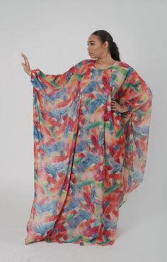 Kaftan made with chiffon crepe  fabric.  Fabric does not stretch.  Can be worn as a beach cover up.  Polyester  Care Instructions: Machine Wash and Air Dry or Dry Clean only. Flowy Multicolor Tunic Cover-up, Spring Beach Chiffon Dress In Georgette, Flowy Multicolor Beachwear Cover-up, Bohemian Chiffon Dress For Vacation, Bohemian Multicolor Maxi Chiffon Dress, Bohemian Sheer Kaftan For Beach, Flowy Multicolor Chiffon Maxi Dress, Spring Beach Maxi Dress In Georgette, Summer Multicolor Tunic Maxi Dress