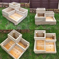 four wooden boxes sitting in the grass