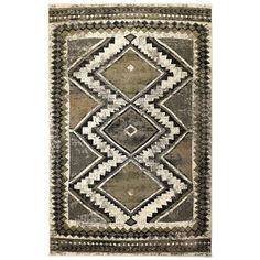 an old rug with geometric designs on the front and back sides, in grey tones