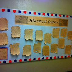 a bulletin board with several different types of historical letters