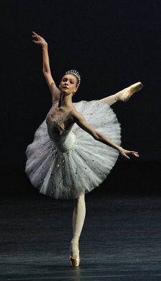 a ballerina in white tutu and tiara