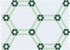 a cross stitch pattern in green and white