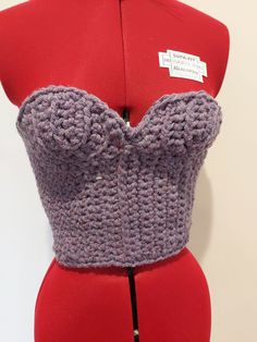 This is a one of a kind crocheted corset top. made from soft chunky purple wool. adjustable at the back so will fit approximately size 8 to 14 measurements - Bust adjustable from 22in to 30in                            cups - 5in side to side & 4.5in top to bottom Fitted Winter Crochet Top With Knit Fabrication, Fitted Crochet Top For Winter, Fitted Hand Knitted Crochet Top For Winter, Fitted Winter Crochet Top, Handmade Fitted Crochet Yarn Top, Handmade Fitted Crochet Top, Crochet Corset Back Top, Underbust Crochet Corset Pattern, Crochet Tulip Corset