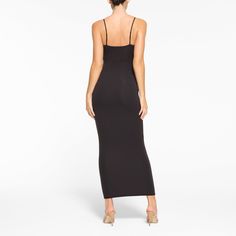 Everything you love about our signature Fits Everybody collection, now in an ultra-flattering dress. This double-lined silhouette is made to hug your body and offer a snatched, smoothed look. Fits true to size. | SKIMS Long Slip Dress | Black | Small | Fits Everybody Fitted Maxi Dress With Built-in Bra, Chic Evening Bodycon Dress With Built-in Bra, Fitted Maxi Dress With Built-in Bra For Night Out, Elegant Fitted Midi Dress With Built-in Bra, Midi Bodycon Dress With Built-in Bra For Date Night, Chic Bodycon Dress With Built-in Bra For Date Night, Elegant Bodycon Dress With Built-in Bra, Elegant Seamless Maxi Dress For Spring, Elegant Stretch Slip Dress With Built-in Bra