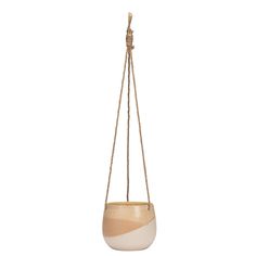 a white and beige hanging planter with two strings attached to the bottom, on a white background