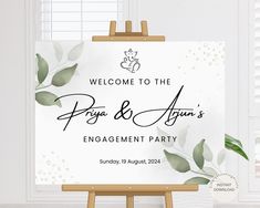 an easel with a sign that says welcome to the pippa & again's engagement party