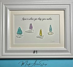 three different colored stones in a white frame with the words, love is when you keep your