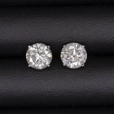 Why we love it:These diamond stud earrings are very impressive in size and offer a forever classic look!Highlights:- 4.5ct pair of natural diamonds- Face up bright white with grades of H-I- Graded SI3-I1 with all white inclusions that blend nicely with the sparkle- Very Good - Excellent cut for lively brilliance!- Classic 14k white gold martini prong settings Round Lab Grown Diamond Earrings With Diamond Cut, Gia Certified Round Lab Grown Diamond Earrings, Round Lab Grown Diamond Fine Jewelry Earrings, Timeless Diamond Cut Diamond White Earrings, Classic Moissanite Earrings In Diamond White, Round Lab Grown Diamond Earrings - Fine Jewelry, Fine Jewelry Lab-grown Diamond Round Cut Earrings, Gia Certified Diamond White Diamond Earrings, Round Cut Lab Grown Diamond Earrings