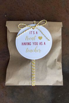 it's a treat having you as a teacher sign on a brown paper bag