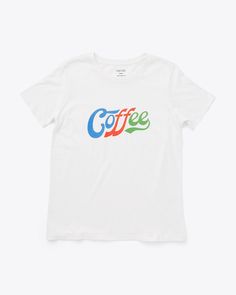 white tee with blue, red and green 'coffee' on the front Casual Coffee-colored Screen Print T-shirt, Coffee Color Crew Neck T-shirt For Everyday, Organic Cotton Short Sleeve T-shirt With Letter Print, Organic Cotton Logo Print T-shirt With Short Sleeves, Organic Cotton Short Sleeve T-shirt With Logo, Coffee Color Short Sleeve T-shirt With Screen Print, Retro Pre-shrunk T-shirt For Everyday, Retro Everyday Pre-shrunk T-shirt, Organic Cotton Graphic Tee With Logo Print