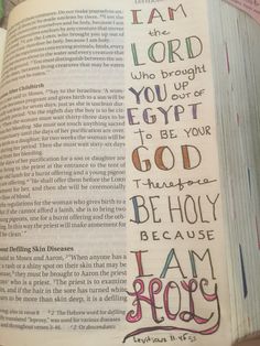 an open bible with the words i am the lord