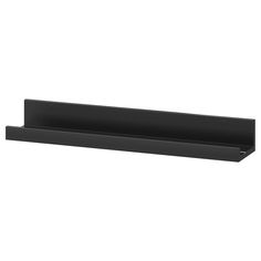 a black shelf that is on the wall