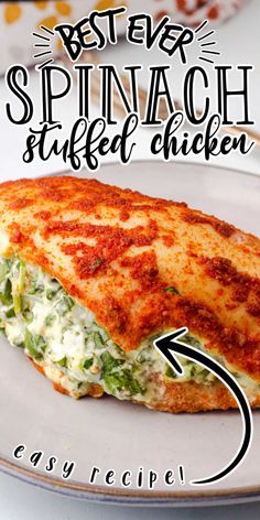 the best ever spinach stuffed chicken recipe on a white plate with an arrow pointing to it