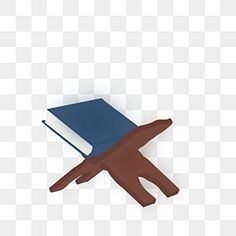 an open book sitting on top of a wooden table with a hand reaching for it