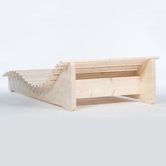 a small wooden bench with an open shelf on the bottom and one section missing from it