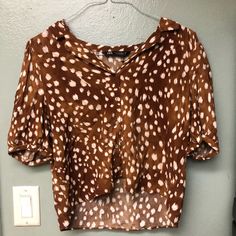 This Is A Zara Blouse That Is Cute And Has A Unique Pattern. This Blouse Is Perfect For The Night Out Of Just A Casual Dinner! Size- Size Xl Condition- Nwot Brown V-neck Shirt For Summer, Zara V-neck Printed Tops, Fall Season Printed Short Sleeve Blouse, Casual Printed Brown Blouse, Fall Printed Short Sleeve Blouse, Chic Printed V-neck Shirt, White Short Sleeve Rayon Top, Brown Collared Spring Blouse, Spring Collared Brown Blouse