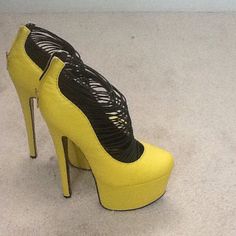 Yellow High Heel Platforms Yellow Platform Heels For Party, Yellow Round Toe Heels For Party, Yellow Platform High Heels, Yellow Closed Toe Platform Heels, Yellow Synthetic Platform Heels, Yellow Round Toe Heels For Evening, Yellow Closed Toe Evening Heels, Yellow Closed Toe Heels In Synthetic Material, Yellow Synthetic Closed Toe Heels