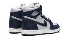 The Air Jordan 1 High ‘85 “Georgetown” is a colorway of Michael Jordan’s first signature shoe that shows appreciation to the Georgetown Hoyas, the college basketball team Jordan famously defeated to earn his first NCAA Championship in 1982.  The Jordan 1 High ‘85 “Georgetown” is a near one-to-one remake of the original Air Jordan 1 High from 1985, as it features an accurate-to-original collar height and shape and panel placement, and upgraded materials.  Specifically, the “Georgetown” colorway appears in the same color block as the Hoyas’ team uniforms, with Tech Grey leather on the perforated toe, mid-panel, and collar, and contrasting College Navy leather on the overlays and Swoosh branding.  A Summit White “Wings” logo appears on the collar and classic “Nike Air” detailing is found on t Adidas Yeezy Women, Original Air Jordans, Jordan Style, Ncaa Championship, Georgetown Hoyas, Blue Jordans, Nike Air Jordan 1, Air Jordan 1 High, Newest Jordans