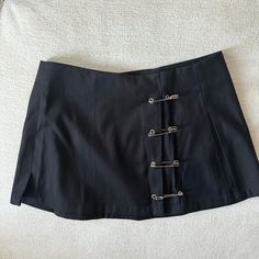 Size Small, Brand New And Never Worn! Super Cute Mini Skirt With Silver Safety Pin Details Black Tiered Mini Skirt, Safety Pin Skirt, Unif Skirt, 2000s Skirt, 90s Mini Skirt, Cute Mini Skirt, Black Velvet Skirt, Ren Fair, Zipper Skirt