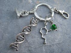 Personalized Scientist Keychain DNA Double by Abundantearthworks  #DNA #doublehelix #scientist #science #scientistkeychain #sciencekeychain #molecule #microscope #dnakeychain #labgift #labkeychain #chemist #chemistkeychain #biologist #biology #chemistrygift #birthstonekeychain #personalizedkeychain #personalized #handmade #madeinusa #abundantearthworks Silver Keychain With Lobster Clasp, Birthstone Keychain, May Emerald, Chemistry Gifts, Crystal Keychain, Keychain Lanyard, Science Lover, Double Helix, Personalized Keychain