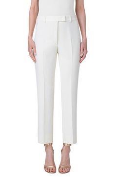 Cut from double-face wool with plenty of shape-retaining stretch, these tailored pants end at the ankles for a footwear-featuring look. 29" inseam; 16 1/2" leg opening; 11 1/4" front rise; 16" back rise (size 8) Zip fly with hook-and-bar closure Front slant zip pockets; back welt pockets 96% wool, 4% elastane Dry clean Made in Romania Designer Clothing Cream Pants With Pressed Crease For Work, Cream Workwear Pants With Pressed Crease, Tailored Elegant Pants, Luxury White Pants For Workwear, Formal Cream Pants With Straight Hem, Elegant Spring Dress Pants With Concealed Placket, White Elastane Pants For Formal Occasions, Elegant Cream Pants With Straight Hem, Elegant White Dress Pants With Straight Hem