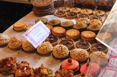 there are many different types of pastries on display