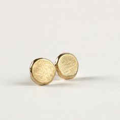 Solid gold post earrings round organic 14k gold by SigalGerson 14k Yellow Gold Circle Earrings, Classic Hammered Earrings For Everyday, Dainty Recycled Gold Earrings, Gold Round Earrings For Everyday, Everyday 14k Yellow Gold Earrings, Round Recycled Gold Earrings As Gift, Minimalist Polished Round Earrings, Minimalist Round Earrings With Polished Finish, Dainty Round Earrings With Polished Finish